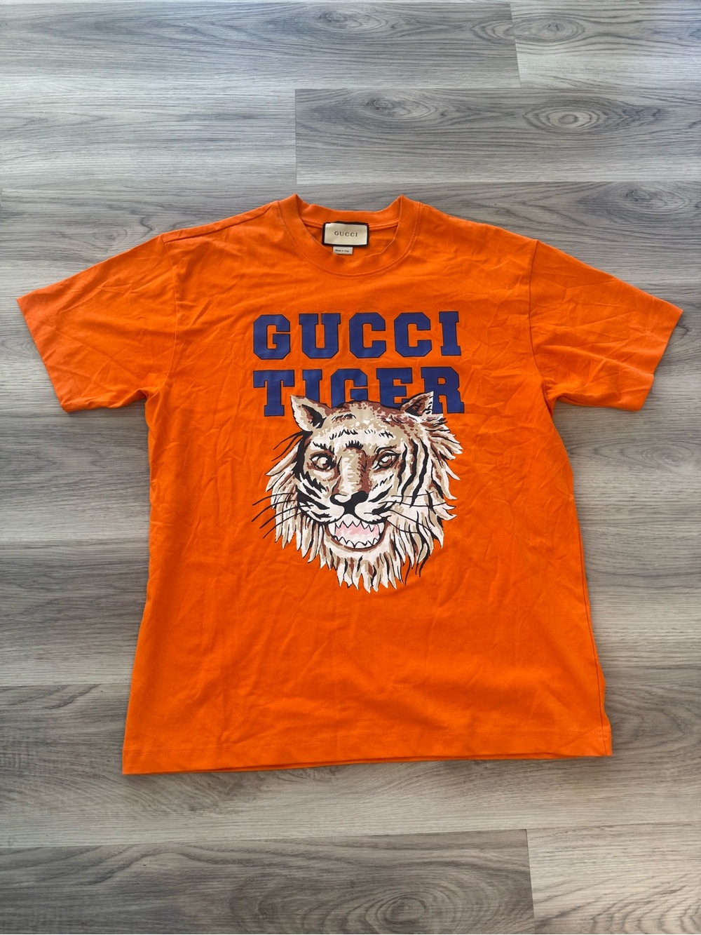 Gucci Orange Tee with Blue 'GUCCI TIGER' and Tiger Graphic